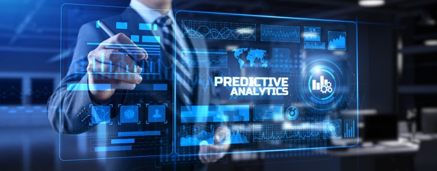 Illustratie bij dit artikel over automatisering, AI en credit risk. De illustratie is in blauwtinten van een man in pak die een scherm bedient met de tekst Predictive Analytics erop.