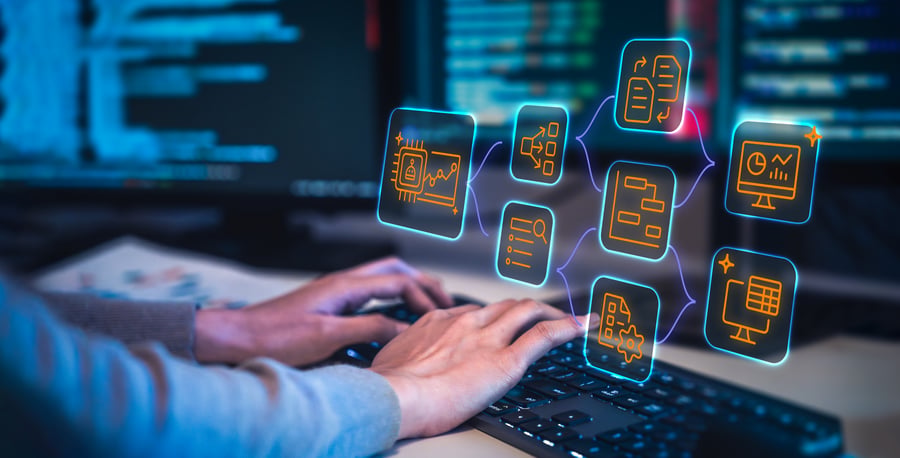 A person typing at a computer with overlaid AI and automation related icons