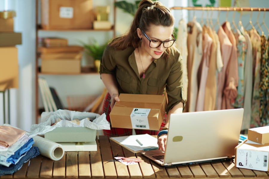 A small business owner doing inventory