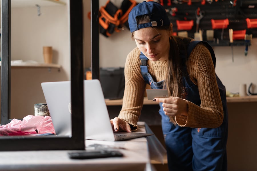 A small business owner checking her business credit report