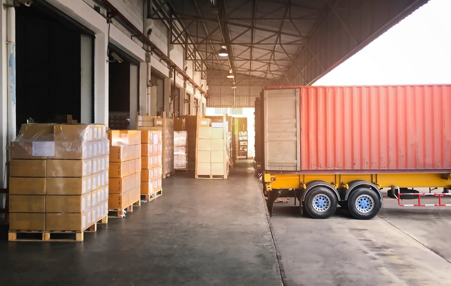A truck waiting for a freight load in a dock