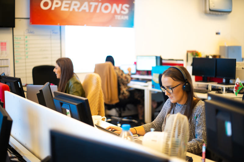 Admin Operations team member on a call.