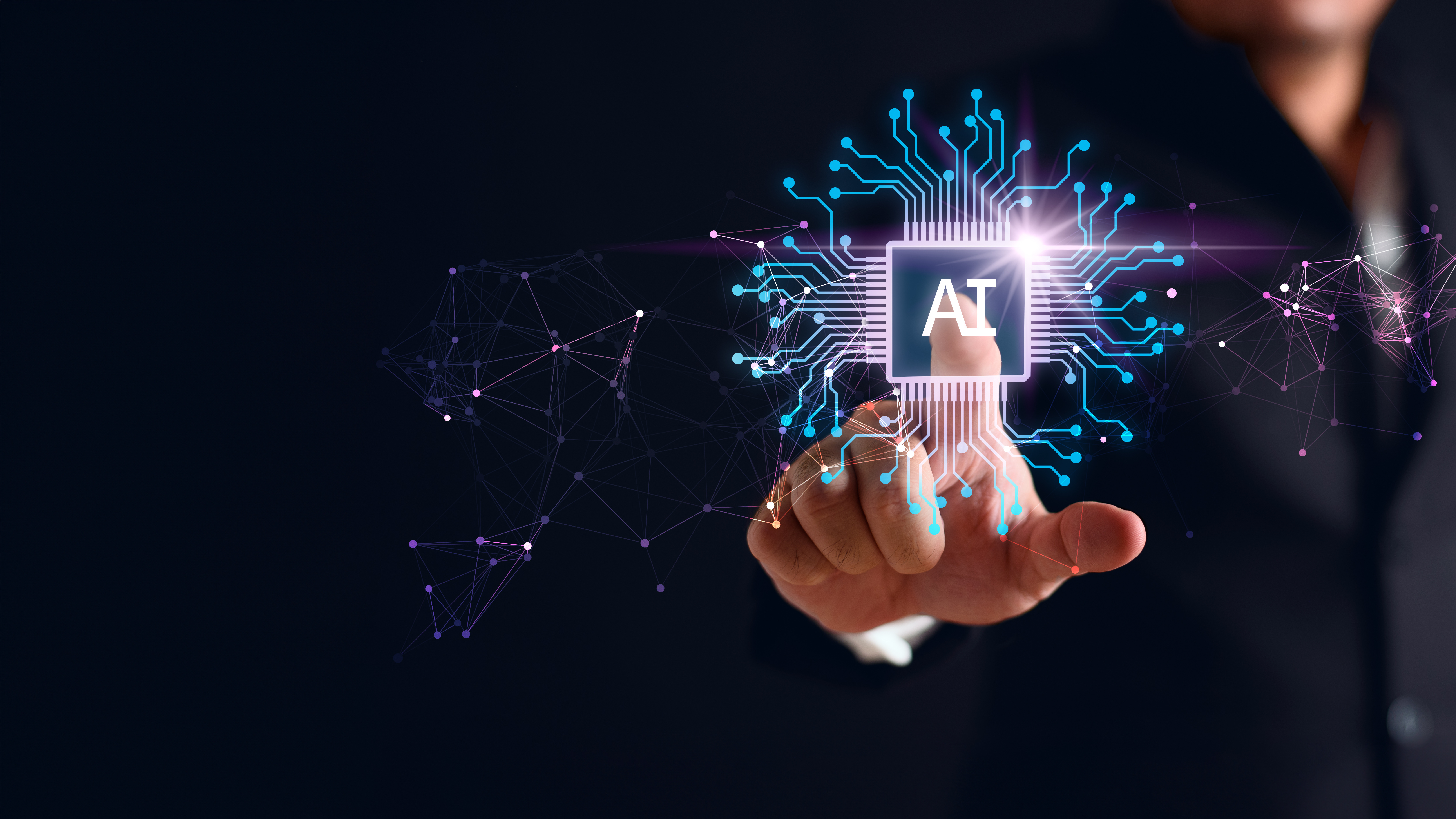 A man pointing at a graphic that says AI