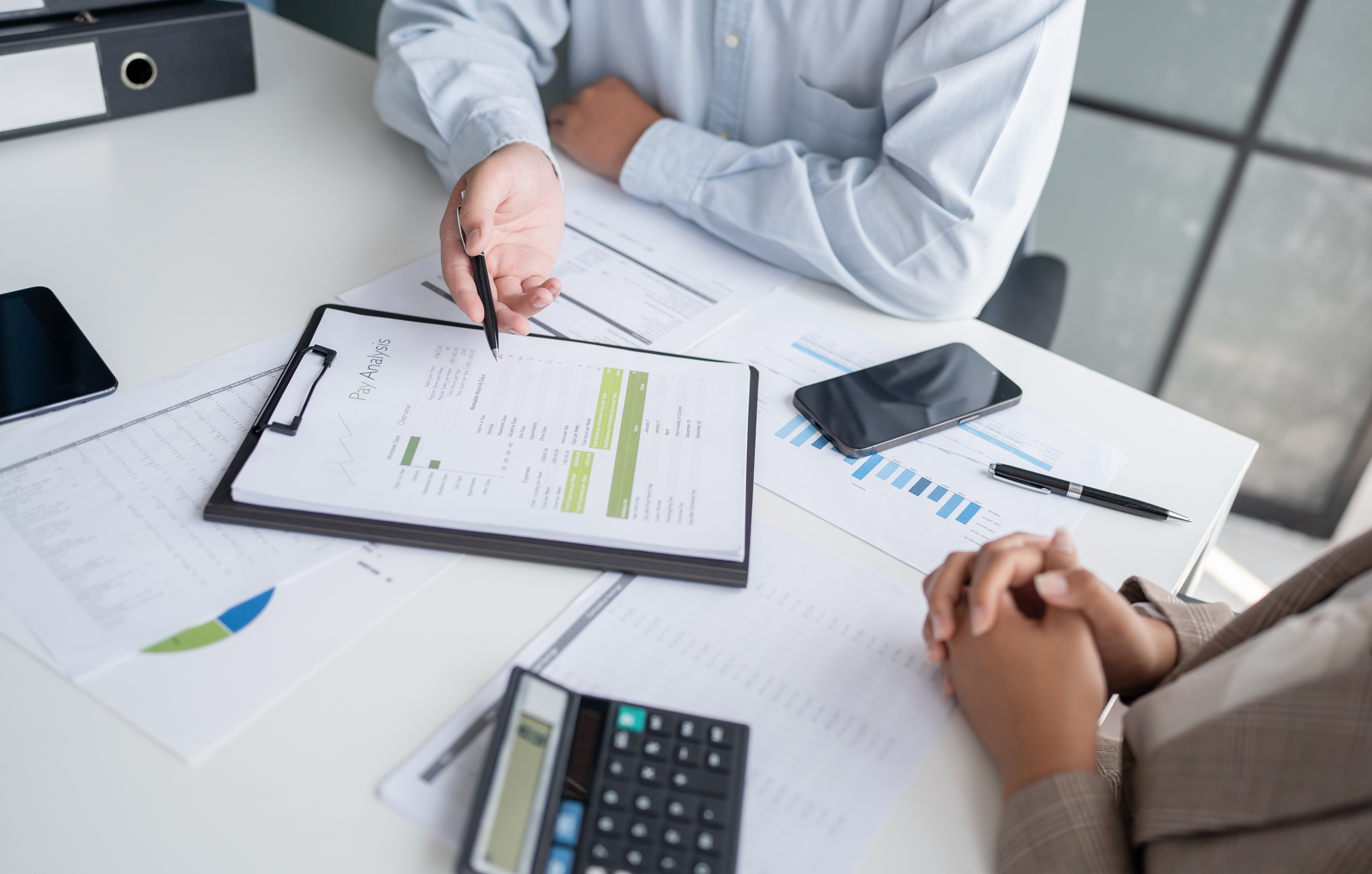 Reports sitting on an office table