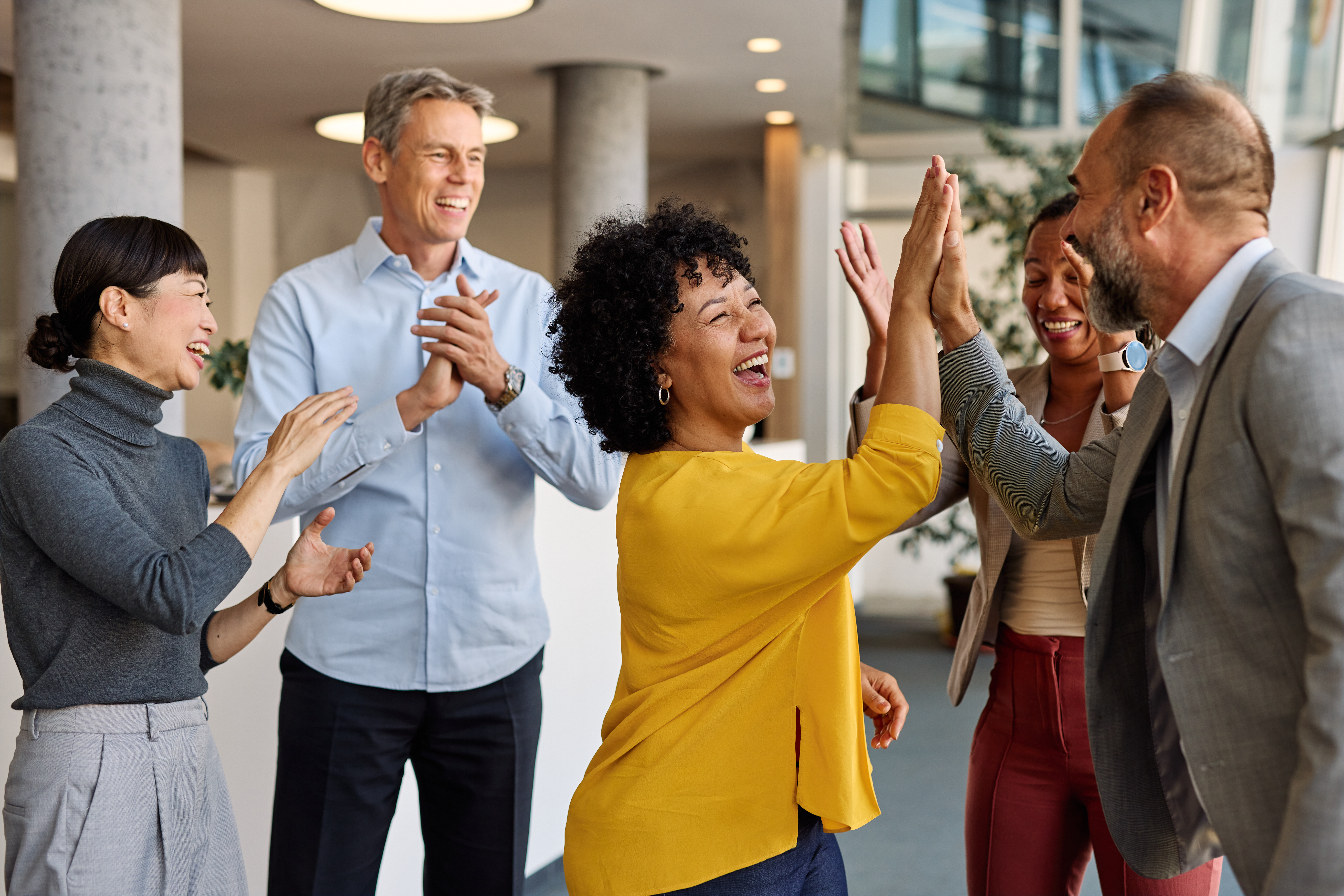 Successful team celebrating increased revenue growth