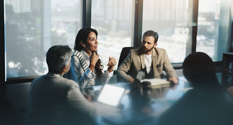 A finance team meet to discuss net 30 accounts